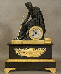 pendule en bronze dor&eacute; et patin&eacute; &agrave; l'astronomie et astrologie repr&eacute;sentant Ptol&eacute;m&eacute;e d'&eacute;poque Restauration