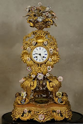 Pendule orientaliste d’époque louis philippe en tôle doré fleurs de porcelaine miniature du bosphore et boîte à musique