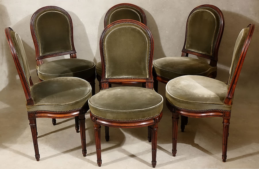 Suite de 6 chaises Louis XVI par Jacob ou Sené en acajou massif 18e
