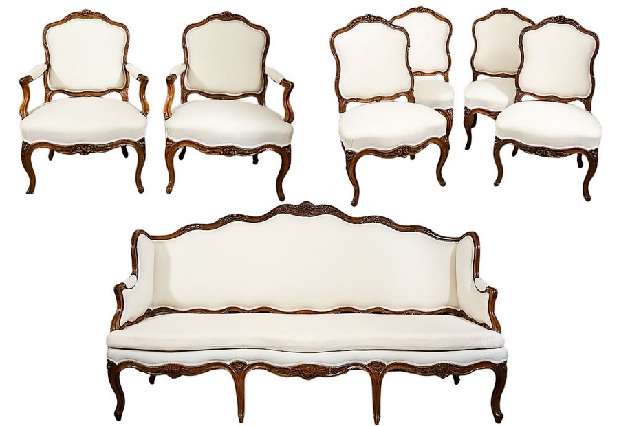 Mobilier de salon Louis XV en noyer composé de deux fauteuils, quatre chaises et un canapé, estampillé Pierre Nogaret à Lyon